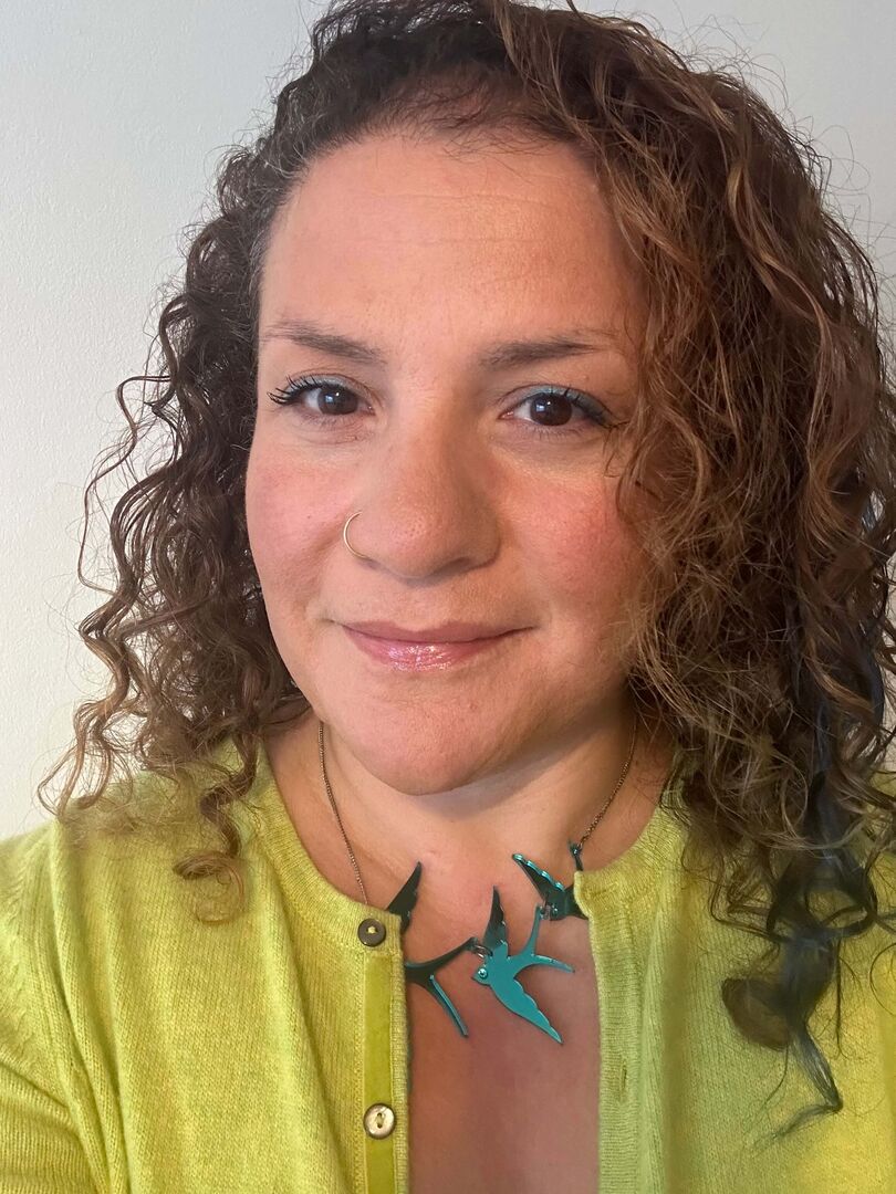 Professional headshot of About Me